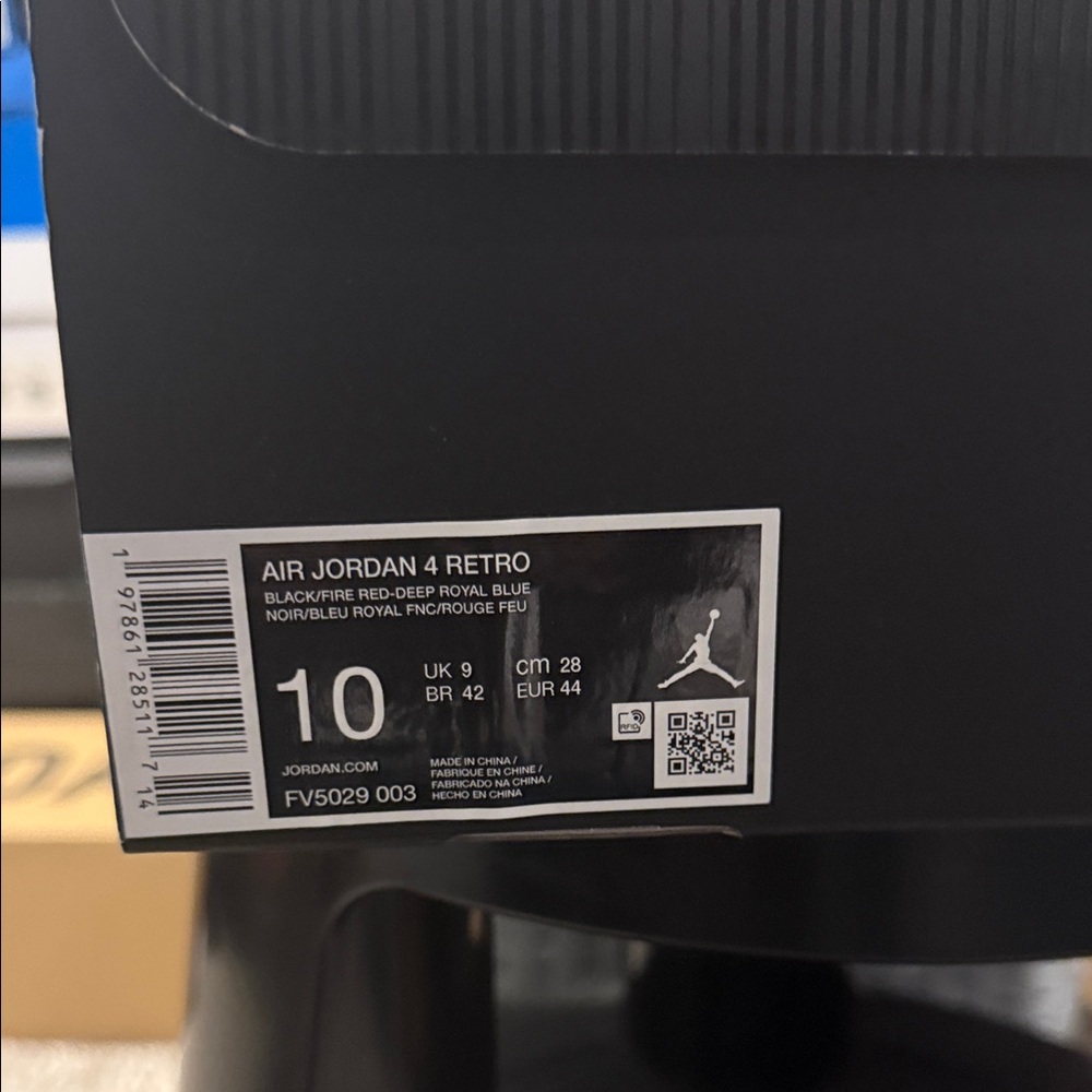 Jordan Air Jordan 4 Retro Black and Blue Sneakers